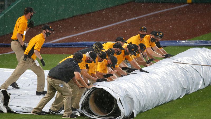 MLB players and coaches are rightly concerned about the lack of social distancing in long rain delays