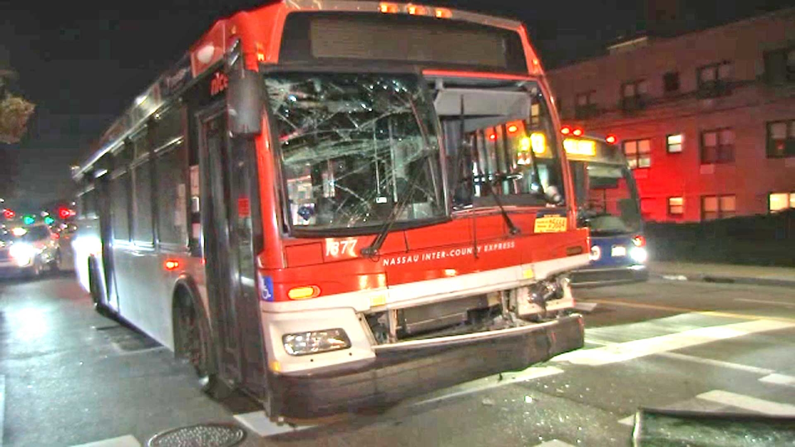Bus collides with garbage truck in Queens; 10 people hurt
