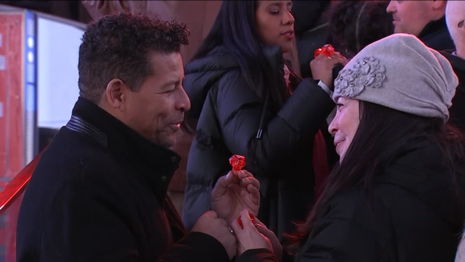 Hundreds celebrate their love by renewing vows in public in Times Square